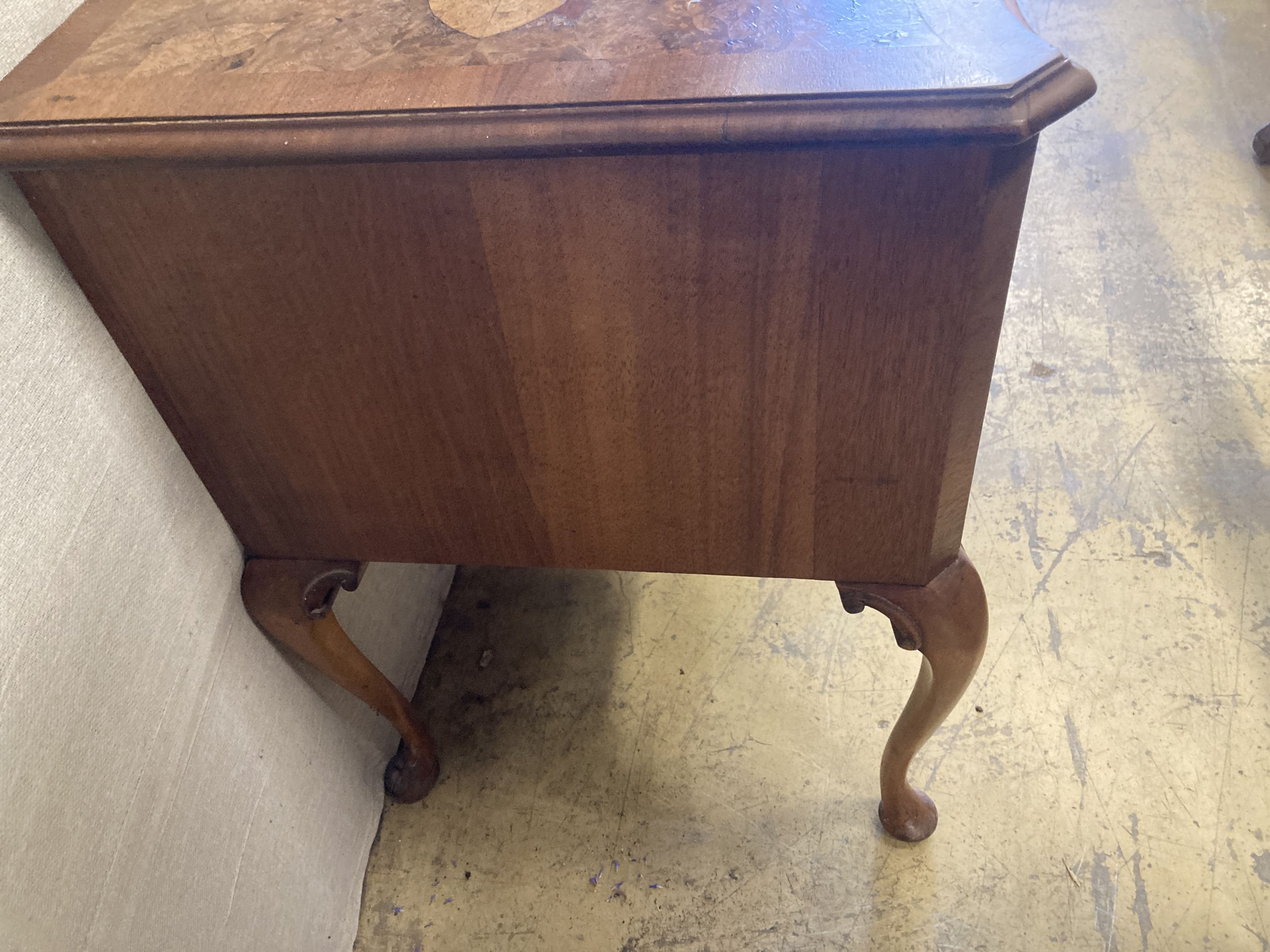 A Queen Anne revival mahogany and walnut breakfront serpentine side table, width 106cm, depth 55cm, height 78cm